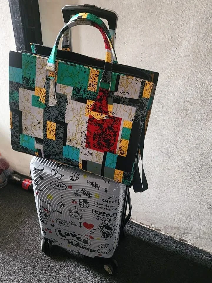Ankara World artisan handcrafting a bag in Lagos, Nigeria